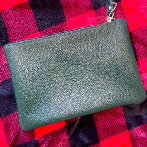 Roots leather zip wallet, just bought not too long ago rarely used it.